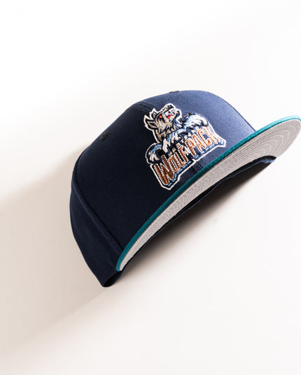 New Era hartford Wolf Pack 59Fifty in oceanside blue, with a shark teal visor and grey undervisor.